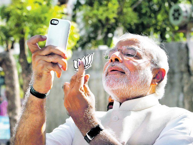 pm modi is photographed while taking a selfie photo file