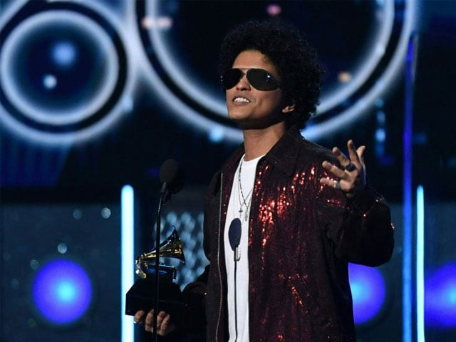bruno mars receives the grammy for record of the year during the 60th annual grammy awards show on january 28 2018 in new york photo afp timothy a clary bruno mars receives the grammy for record of the year during the 60th annual grammy awards show on january 28 2018 in new york photo afp timothy a clary