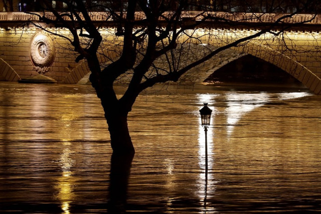 flooded banks of the seine river in paris photo afp flooded banks of the seine river in paris photo afp