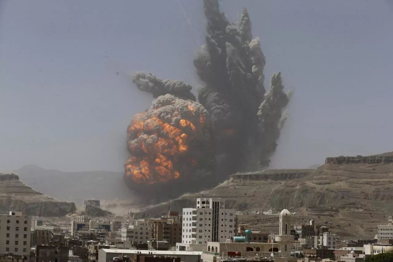 smoke rises during an air strike on an army weapons depot on a mountain overlooking sanaa photo reuters