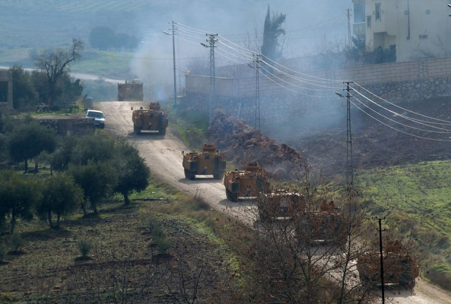 turkish military armoured vehicles arrive at a border village near the town of hassa in hatay province turkey photo reuters turkish military armoured vehicles arrive at a border village near the town of hassa in hatay province turkey photo reuters