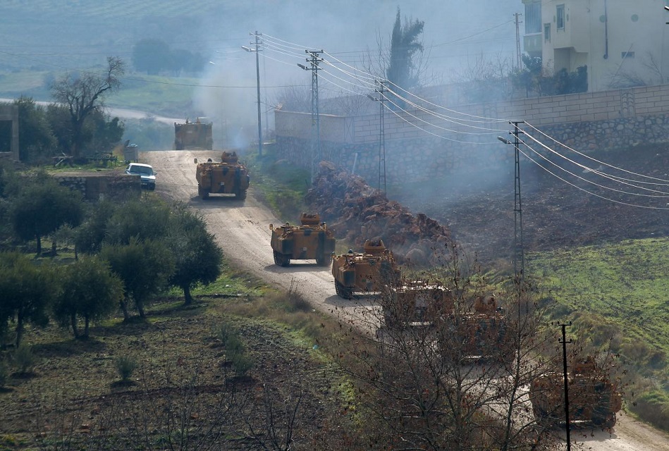 turkish military armoured vehicles arrive at a border village near the town of hassa in hatay province turkey photo reuters