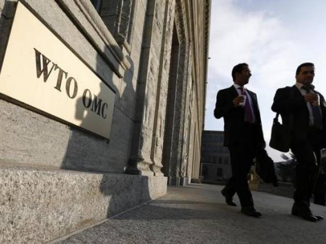 delegates arrives for a special meeting of the general council preparatory committee on trade facilitation at the world trade organization wto headquarters in geneva november 27 2014 photo reuters