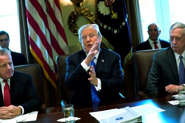 us president donald trump flanked by deputy secretary of state john sullivan l and defense secretary james mattis r speaks to reporters before he holds a cabinet meeting at the white house in washington us december 6 2017 photo reuters file us president donald trump flanked by deputy secretary of state john sullivan l and defense secretary james mattis r speaks to reporters before he holds a cabinet meeting at the white house in washington us december 6 2017 photo reuters file