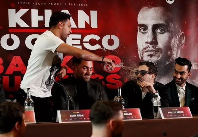 boxing amir khan press conference liverpool britain january 30 2018 amir khan throws water into the face of phil lo greco during the press conference as promoter eddie hearn looks on photo reuters boxing amir khan press conference liverpool britain january 30 2018 amir khan throws water into the face of phil lo greco during the press conference as promoter eddie hearn looks on photo reuters