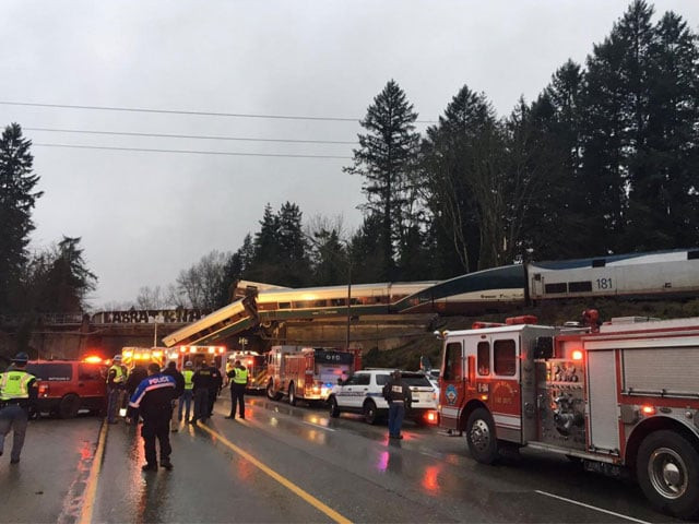 first responders are seen at the scene of an amtrak passenger train derailment on interstate highway i 5 in washington us december 18 2017 photo reuters file first responders are seen at the scene of an amtrak passenger train derailment on interstate highway i 5 in washington us december 18 2017 photo reuters file