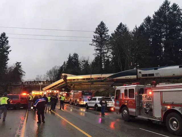first responders are seen at the scene of an amtrak passenger train derailment on interstate highway i 5 in washington us december 18 2017 photo reuters file first responders are seen at the scene of an amtrak passenger train derailment on interstate highway i 5 in washington us december 18 2017 photo reuters file