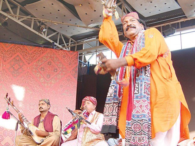 an artist at the festival presents sindhi folk dance at the lok virsa photo muhammad javaid file