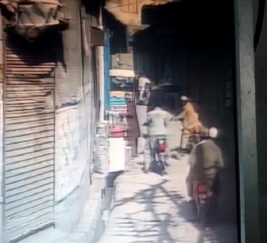 cctv footage shows unidentified armed men shooting down the victim in broad daylight screengrab cctv footage shows unidentified armed men shooting down the victim in broad daylight screengrab