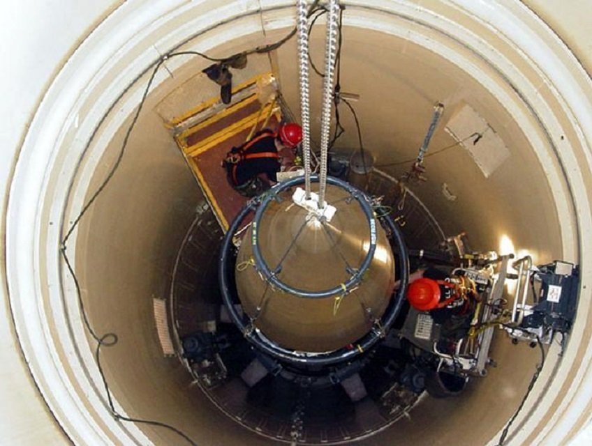 a us air force missile maintenance team removes the upper section of an intercontinental ballistic missile with a nuclear warhead in an undated usaf photo at malmstrom air force base montana photo reuters file