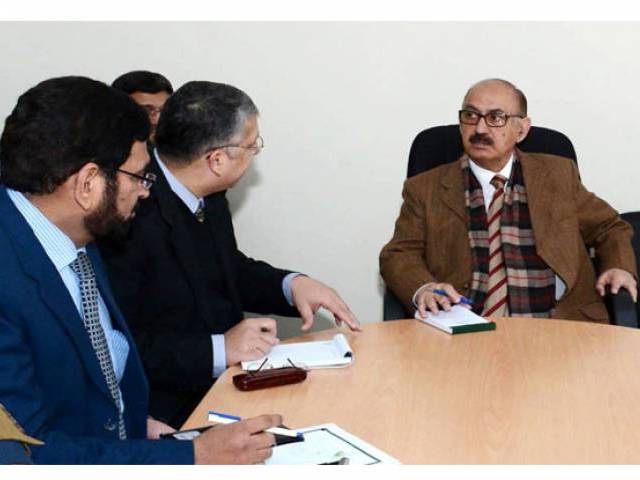 adviser to the prime minister on national history and literary heritage irfan siddiqui chairing a meeting photo inp file