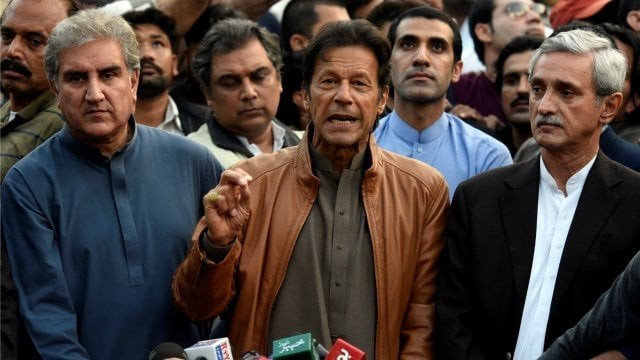 imran khan with shah mehmood qureshi left and jahangir tareen right photo reuters