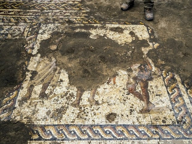 israeli archaeologists have found a rare roman era mosaic depicting propsperous looking men wearing togas during excavations at the ancient mediterranean port of caesarea north of tel aviv and unveiled it on february 8 2018 photo afp israeli archaeologists have found a rare roman era mosaic depicting propsperous looking men wearing togas during excavations at the ancient mediterranean port of caesarea north of tel aviv and unveiled it on february 8 2018 photo afp