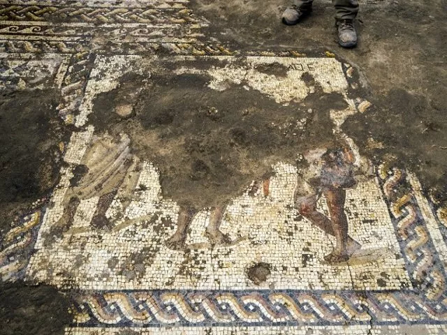 israeli archaeologists have found a rare roman era mosaic depicting propsperous looking men wearing togas during excavations at the ancient mediterranean port of caesarea north of tel aviv and unveiled it on february 8 2018 photo afp israeli archaeologists have found a rare roman era mosaic depicting propsperous looking men wearing togas during excavations at the ancient mediterranean port of caesarea north of tel aviv and unveiled it on february 8 2018 photo afp