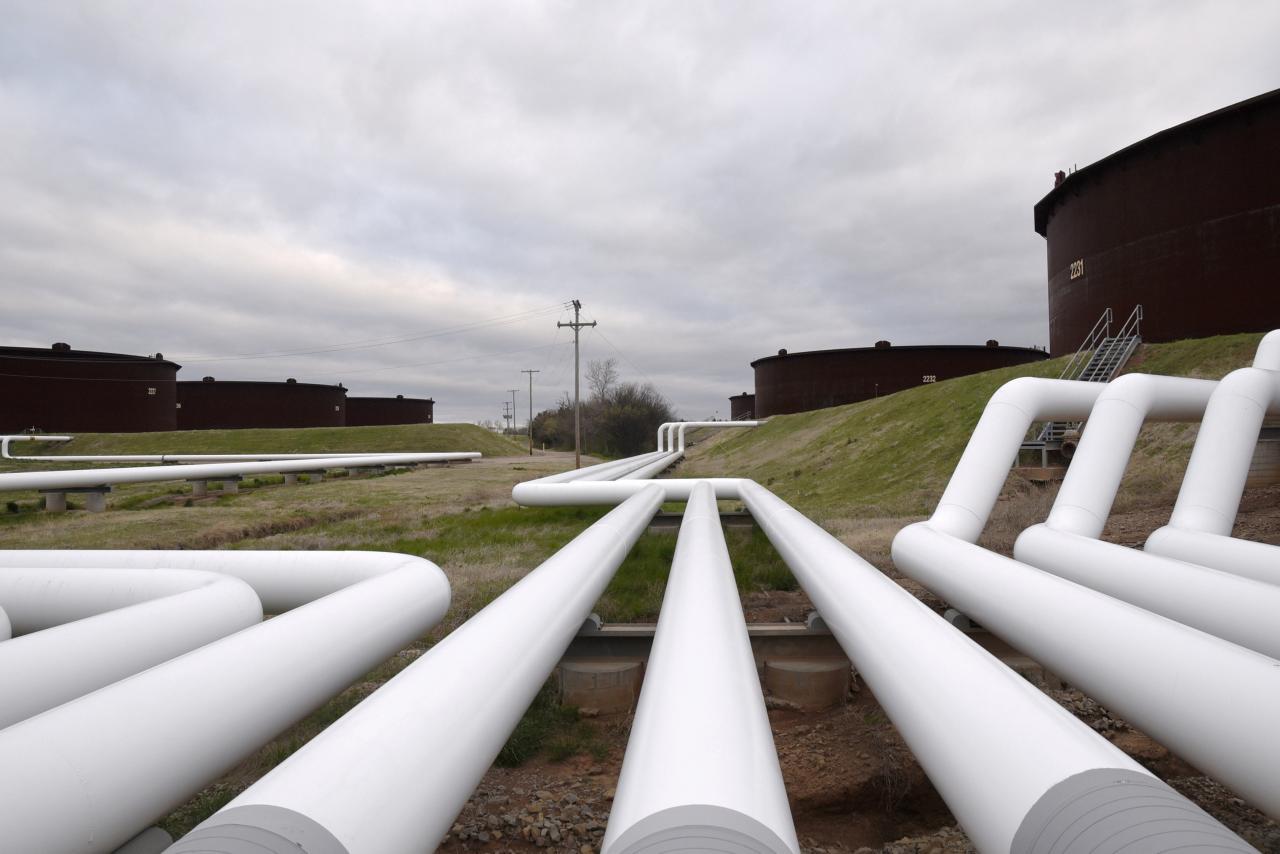 pipelines run to enbridge crude oil storage tanks at their tank farm in cushing oklahoma photo reuters