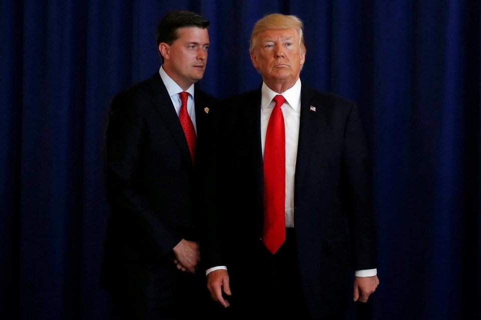 white house staff secretary rob porter l reminds us president donald trump he had a bill to sign after he departed quickly following remarks at his golf estate in bedminster new jersey us august 12 2017 photo reuters file