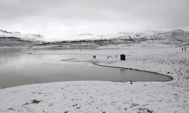 a general view of people visiting the snow covered hanna lake before it ran dry photo reuters a general view of people visiting the snow covered hanna lake before it ran dry photo reuters