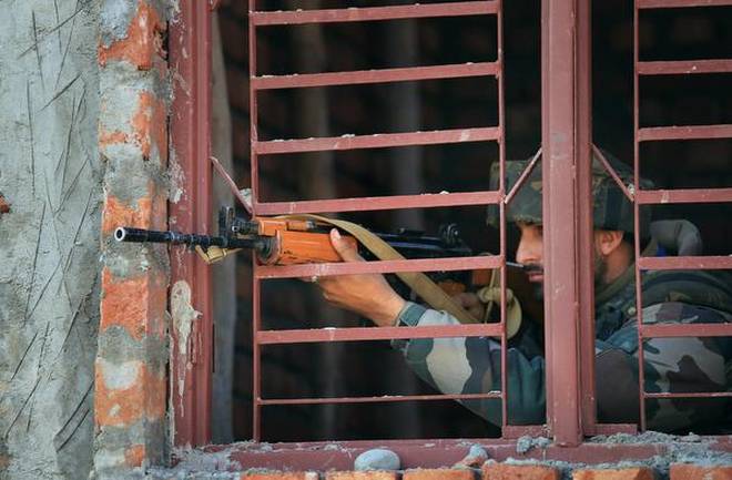 a security personnel takes position near the encounter site outside 36 brigade indian army camp in sunjuwan area photo courtesy the hindu