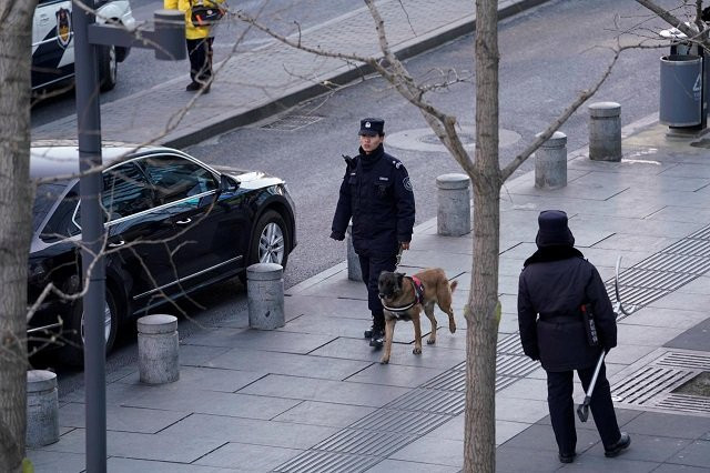 police patrol outside the joy city mall in the xidan district after a knife attack in beijing china february 11 2018 photo reuters police patrol outside the joy city mall in the xidan district after a knife attack in beijing china february 11 2018 photo reuters