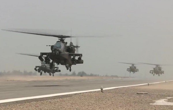 a us made egyptian army apache attack helicopters flies from an airfield in an operation against militant hideouts in the insurgency wracked north sinai photo afp