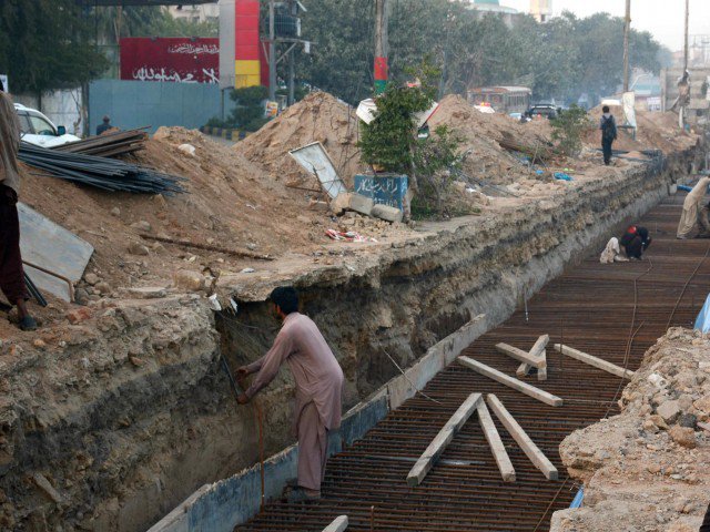 development work for green line bus rapid transit project being done on ma jinnah road in karachi photo file