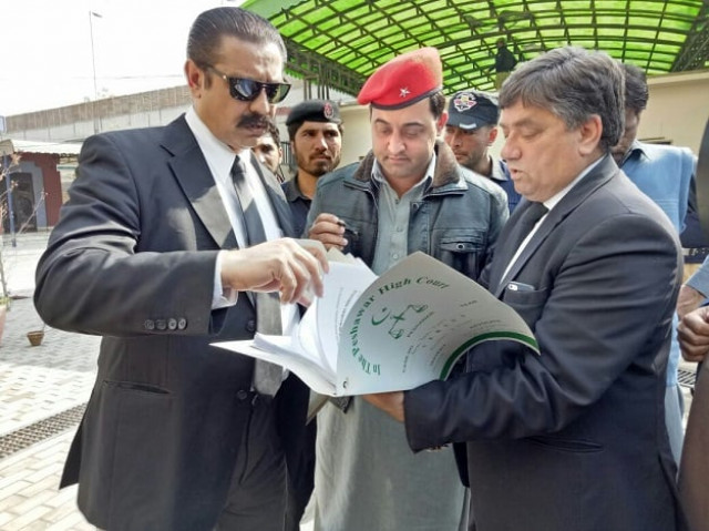 aimal khan signs petition before it is filed in phc photo express