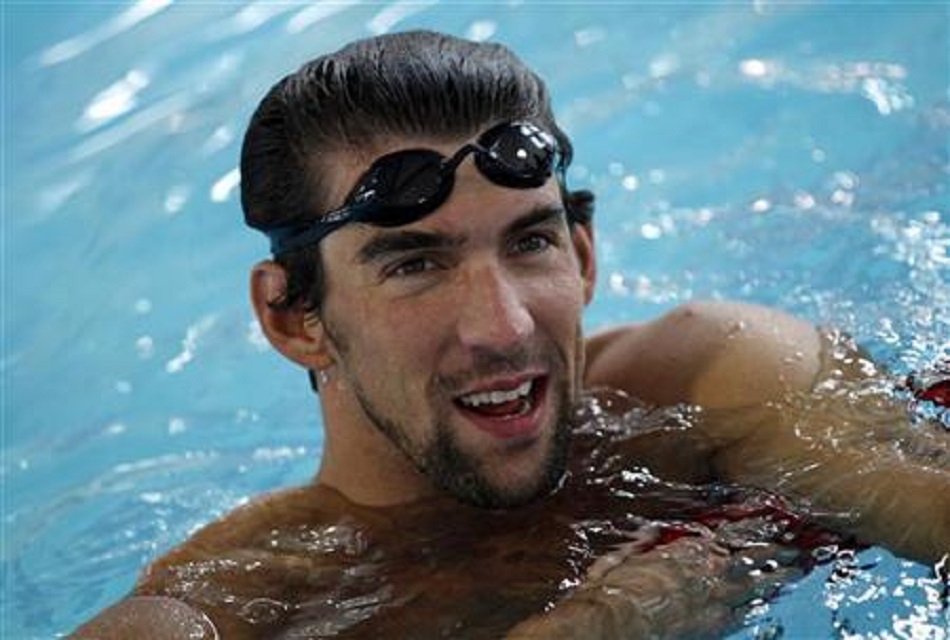 us olympic gold medallist swimmer michael phelps takes a break from a swim at new york 039 s chelsea piers sports center september 27 2011 photo reuters
