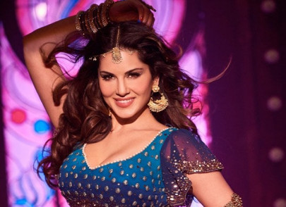 indian farmer puts up sunny leone poster to ward off evil eye