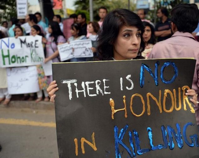 pakistani human rights activists hold placards during a protest in islamabad against 039 honour killings 039 on may 29 2014 photo afp