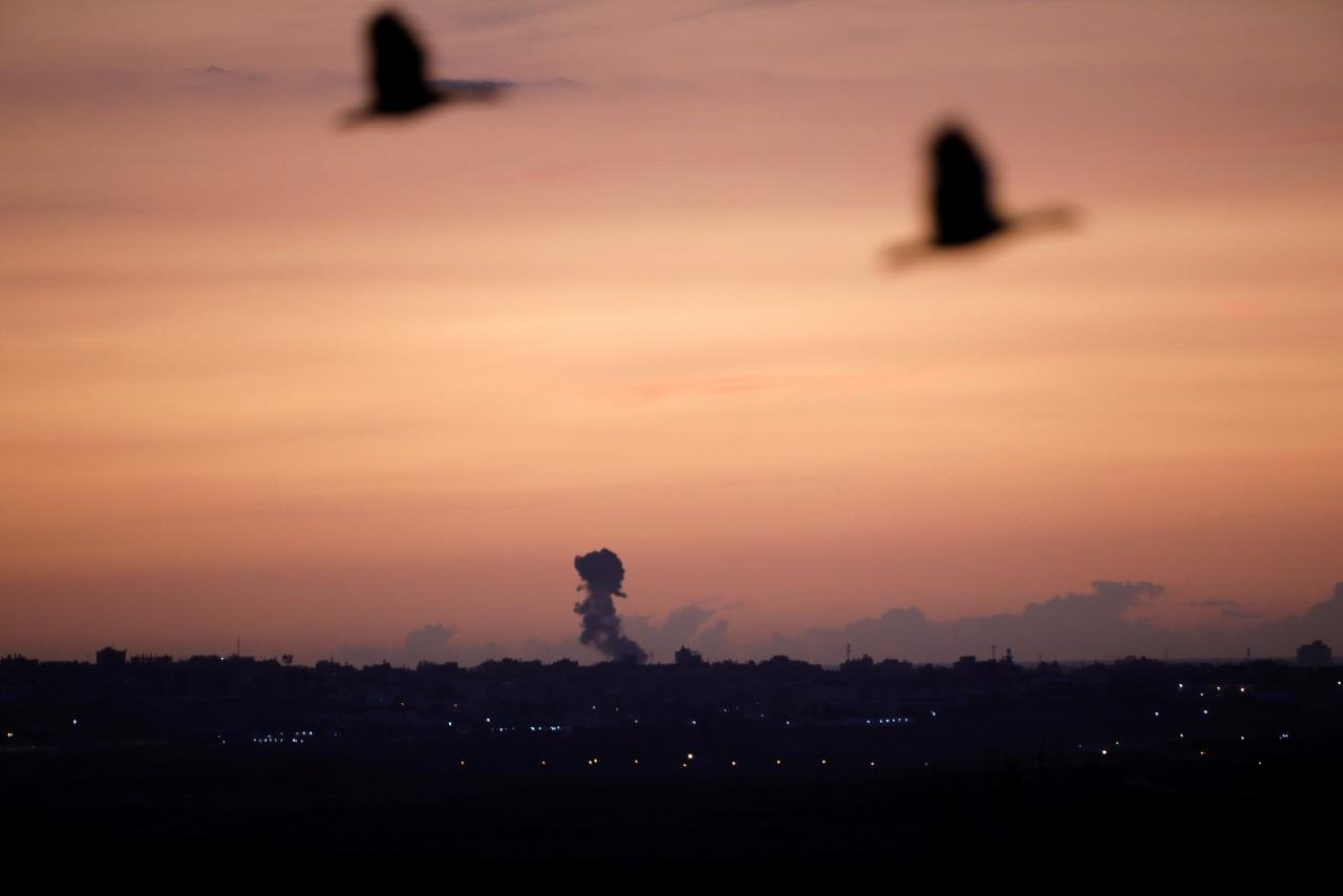 smoke rises at the gaza strip following an israeli strike as seen from the israeli side of the border photo reuters