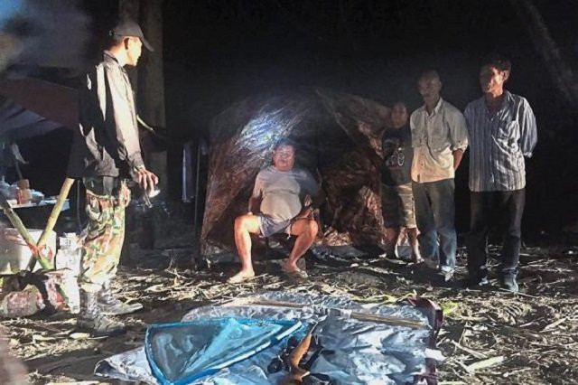 premchai being arrested by authorities in the thungyai naresuan national park in kanchanaburi province photo afp premchai being arrested by authorities in the thungyai naresuan national park in kanchanaburi province photo afp