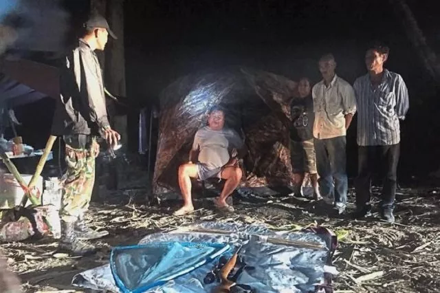 premchai being arrested by authorities in the thungyai naresuan national park in kanchanaburi province photo afp premchai being arrested by authorities in the thungyai naresuan national park in kanchanaburi province photo afp