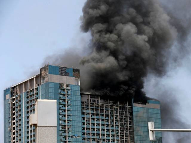 rescuers discovered nine more bodies sunday beneath the ruins of a indian hotel photo reuters rescuers discovered nine more bodies sunday beneath the ruins of a indian hotel photo reuters