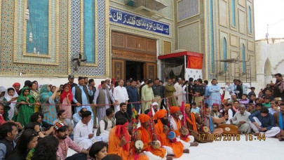 devotees perform dhamaal in memory of sehwan blast victims devotees perform dhamaal in memory of sehwan blast victims