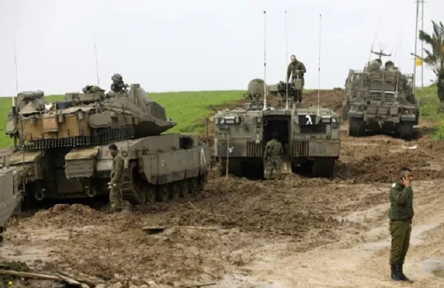 israeli soldiers monitor an area near the border with gaza on sunday photo afp israeli soldiers monitor an area near the border with gaza on sunday photo afp