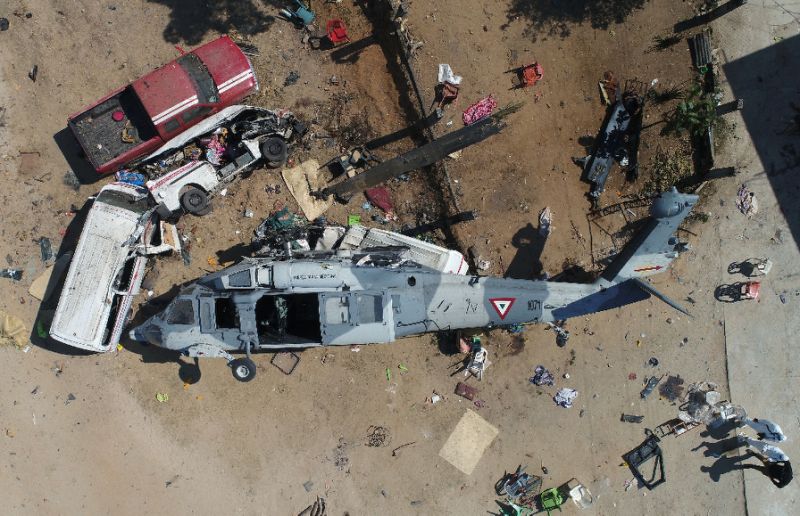 a helicopter crashed february 17 2018 on residents camping outdoors after a 7 2 magnitude quake in santiago jamiltepec mexico photo afp