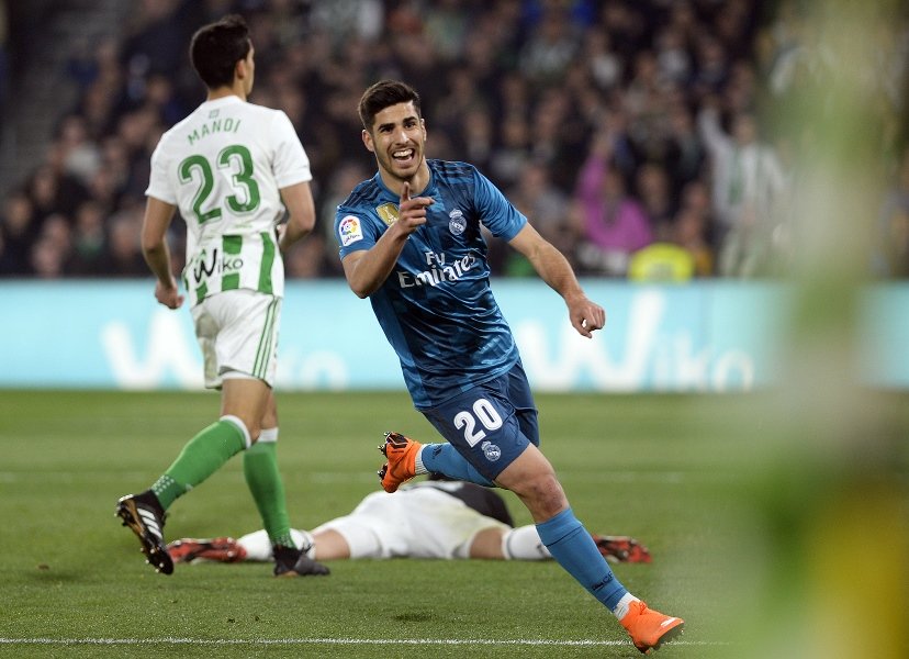 asensio stars as real down betis in eight goal thriller