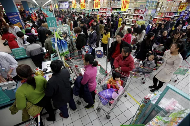 customers queue to pay as they shop at a carrefour supermarket in wuhan hubei province december 3 2011 photo reuters customers queue to pay as they shop at a carrefour supermarket in wuhan hubei province december 3 2011 photo reuters