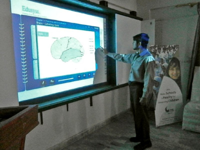 a grade ix student of hilal public school familiarises himself with the new smart class project which uses multimedia to explain scientific concepts to students photo courtesy gct a grade ix student of hilal public school familiarises himself with the new smart class project which uses multimedia to explain scientific concepts to students photo courtesy gct