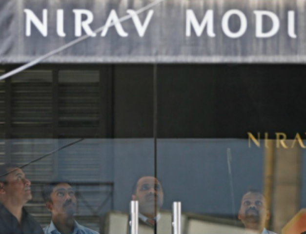 security guards stand inside a nirav modi showroom during a raid by the enforcement directorate a government agency that fights financial crime in new delhi india february 15 2018 photo reuters