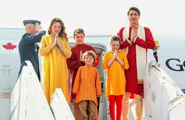 canadian prime minister justin trudeau and his family pose for a photo as they arrive in ahmedabad india photo afp