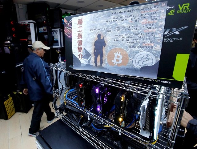 a cryptocurrency mining computer equipped with high end graphic cards is seen on display at a computer mall in hong kong china january 29 2018 picture taken january 29 2018 photo reuters