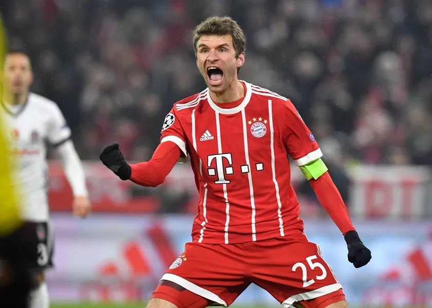 bayern munich 039 s midfielder thomas mueller celebrates after he scored a second goal during the uefa champions league round of sixteen first leg football match bayern munich vs besiktas istanbul on february 20 2018 in munich southern germany photo afp bayern munich 039 s midfielder thomas mueller celebrates after he scored a second goal during the uefa champions league round of sixteen first leg football match bayern munich vs besiktas istanbul on february 20 2018 in munich southern germany photo afp
