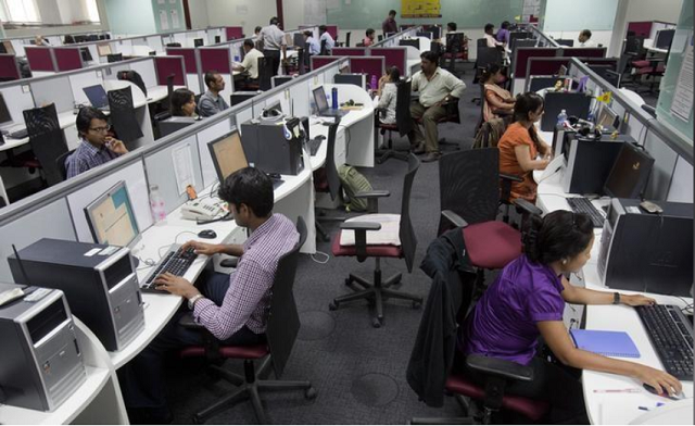 workers are seen at their workstations on the floor of an outsourcing centre in bangalore february 29 2012 photo reuters workers are seen at their workstations on the floor of an outsourcing centre in bangalore february 29 2012 photo reuters