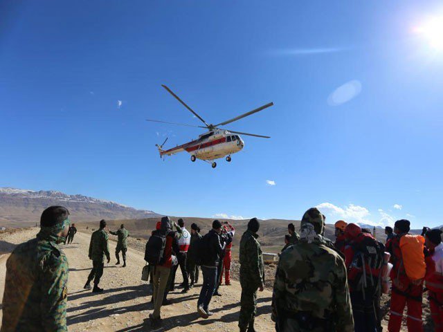 members of emergency and rescue team search for the plane that crashed in a mountainous area of central iran february 19 2018 photo reuters