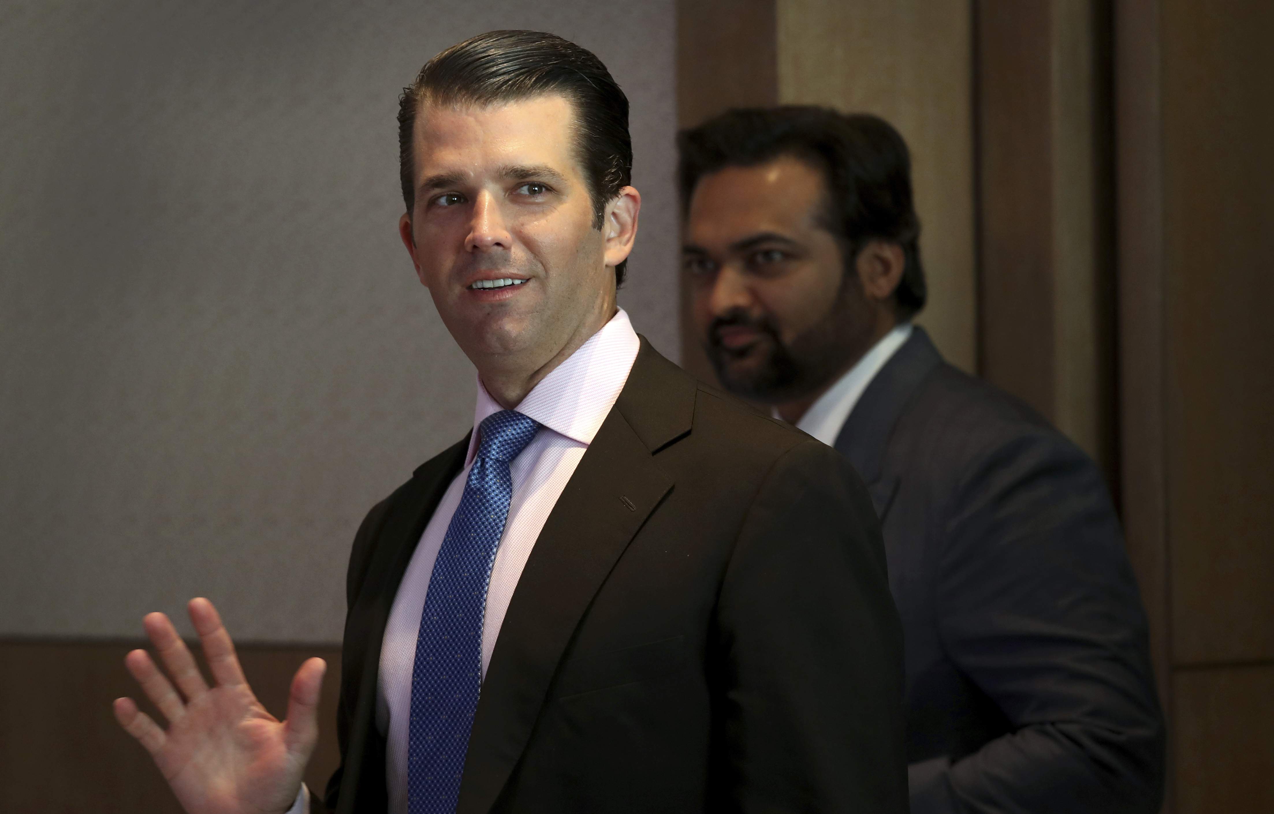 donald trump jr waves to media as he arrives for a meeting in new delhi photo afp