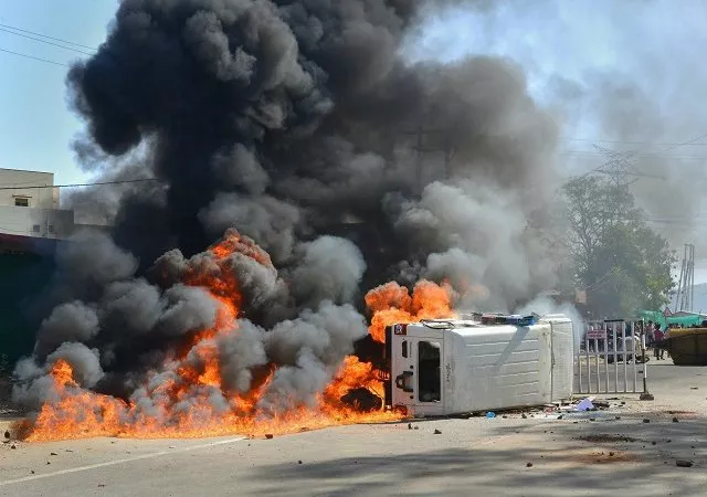 a police van set on fire by an angry mob after a speeding truck rammed into a house and a shop in barela jabalpur photo courtesy of press trust of india a police van set on fire by an angry mob after a speeding truck rammed into a house and a shop in barela jabalpur photo courtesy of press trust of india