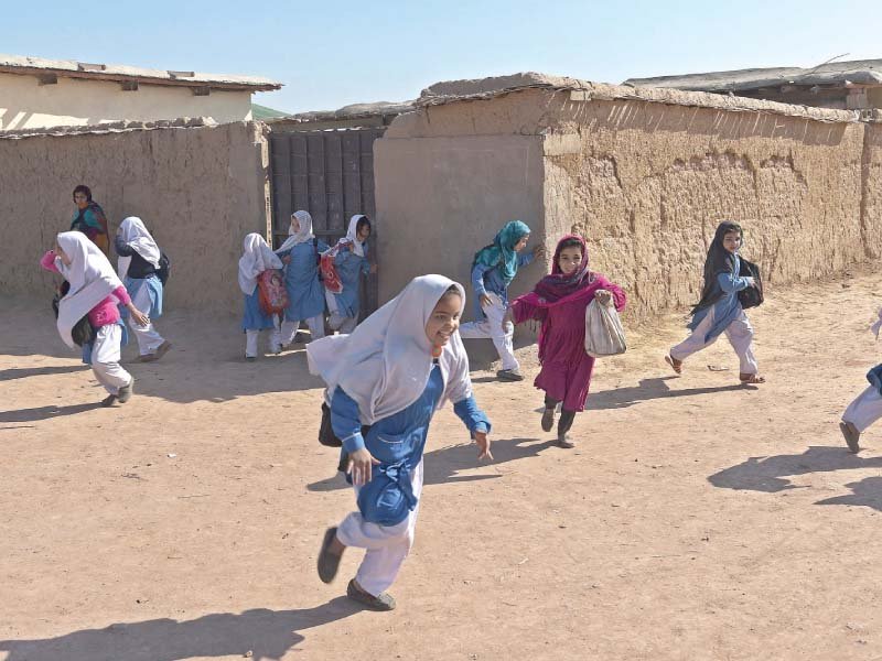 children rush out of school photo reuters