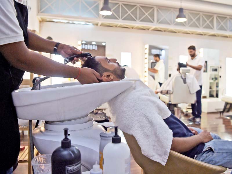 people getting services at a high end salon in islamabad photo afp