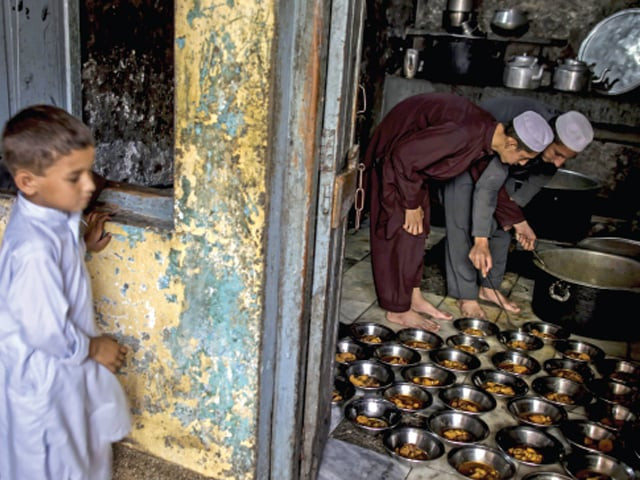 dinner time students prepare food for schoolmates at darul uloom haqqania photo reuters file dinner time students prepare food for schoolmates at darul uloom haqqania photo reuters file